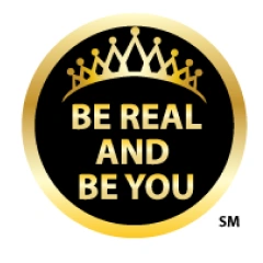 A black and gold sticker with the words " be real and be you ".