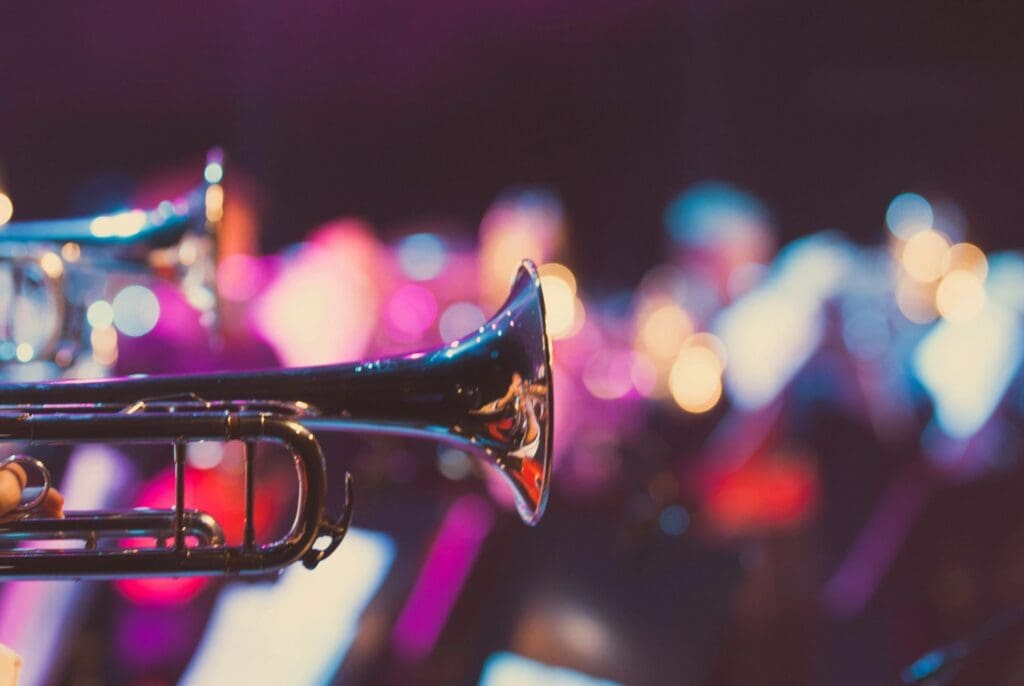 Trumpet in a colorful concert setting.